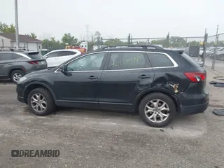 2014 Mazda CX-9 Sport with VIN JM3TB3BV8E0437180, listed as a IAAI auction lot 42413844 with 177,393 mi miles and . Bid and sale history available at DreamBid. Image 14.