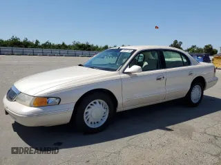 1995 Lincoln Continental z VIN 1LNLM97V3SY641554, wystawiony jako Copart lot #55001165 z przebiegiem 173 490 mil mil oraz Szkody całkowita. Historia ofert i sprzedaży dostępna na DreamBid. Obrazek 1.