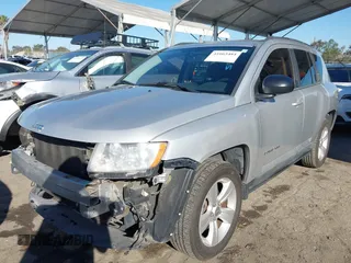 2011 Jeep Compass with VIN 1J4NT1FA4BD139153, listed as a IAAI auction lot 41665481 with 164,412 mi miles. Bid and sale history available at carsss.com. Image 18.