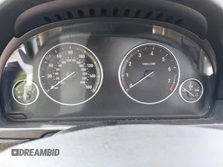 2014 BMW 5 Series 535i with VIN WBA5B1C56ED483780, listed as a IAAI auction lot 42308960 with 155,037 mi miles and . Bid and sale history available at DreamBid. Image 7.