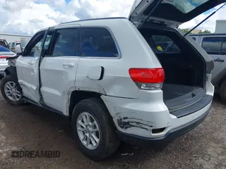 2018 Jeep Grand Cherokee Altitude with VIN 1C4RJEAGXJC171254, listed as a IAAI auction lot 42192395 with 210,890 mi miles and . Bid and sale history available at DreamBid. Image 3.