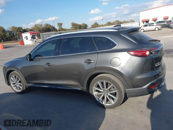 2016 Mazda CX-9 Grand Touring with VIN JM3TCADY8G0114940, listed as a IAAI auction lot 40701187 with 112,311 mi miles and . Bid and sale history available at DreamBid. Image 14.
