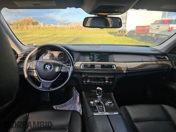 2012 BMW 7 Series 740i with VIN WBAKA4C52CC613791, listed as a Copart auction lot 82473894 with 132,656 mi miles and Clean Title. Bid and sale history available at carsss.com. Image 9.