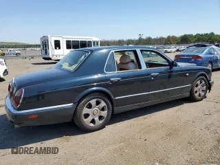 2001 Bentley Arnage with VIN SCBLC31E31CX05992, listed as a Copart auction lot 60462974 with 253,028 mi miles and Salvage Title. Bid and sale history available at DreamBid. Image 3.