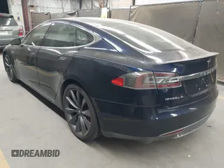 2014 Tesla Model S 60 with VIN 5YJSA1H11EFP56406, listed as a IAAI auction lot 42065157 with Not Provided miles and . Bid and sale history available at DreamBid. Image 3.