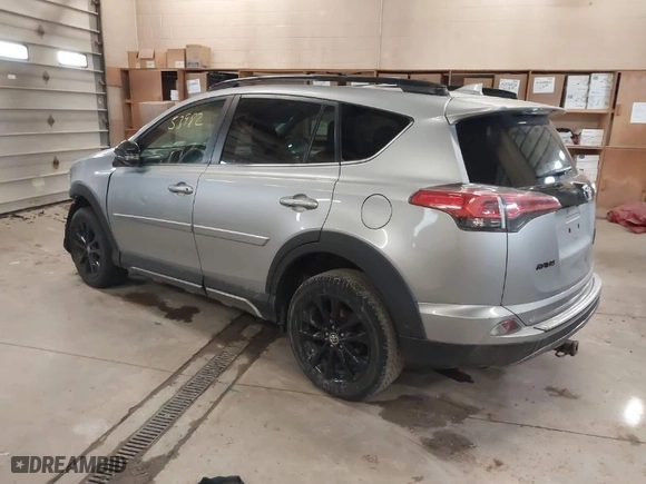 2018 Toyota RAV4 XLE with VIN 2T3RFREV4JW765403, listed as a IAAI auction lot 41853982 with 113,531 mi miles. Bid and sale history available at carsss.com. Image 3.