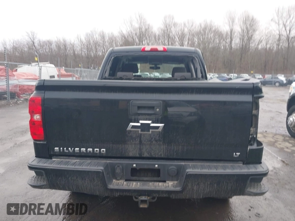 2018 Chevrolet Silverado 1500 LT with VIN 3GCUKREC5JG460979, listed as a IAAI auction lot 41741667 with 122,931 mi miles. Bid and sale history available at carsss.com. Image 17.