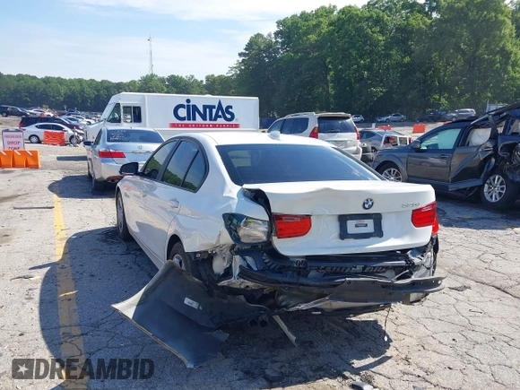2014 BMW 3 Series 328i with VIN WBA3A5C58EP602669, listed as a IAAI auction lot 42514389 with 187,330 mi miles and . Bid and sale history available at DreamBid. Image 3.
