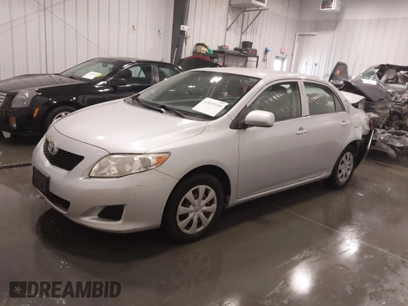 2009 Toyota Corolla with VIN JTDBL40E099056290, listed as a IAAI auction lot 42039105 with 94,043 mi miles and . Bid and sale history available at carsss.com. Image 2.