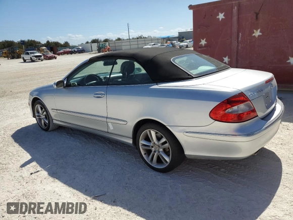2007 Mercedes-Benz CLK-Class 3.5L with VIN WDBTK56FX7F206030, listed as a Copart auction lot 77271194 with 155,157 mi miles and Salvage Title. Bid and sale history available at carsss.com. Image 2.