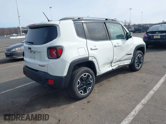 2015 Jeep Renegade Trailhawk with VIN ZACCJBCT6FPB32422, listed as a IAAI auction lot 41618410 with 42,219 mi miles and . Bid and sale history available at DreamBid. Image 4.