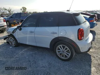 2016 MINI Countryman S z VIN WMWZC3C55GWT10205, wystawiony jako Copart lot #58308765 z przebiegiem 65 890 mil mil oraz Szkoda całkowita • Salvage title. Historia ofert i sprzedaży dostępna na DreamBid. Obrazek 2.