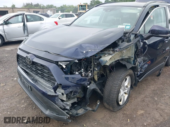 2019 Toyota RAV4 XLE with VIN 2T3P1RFVXKC057616, listed as a IAAI auction lot 42685158 with 148,661 mi miles and . Bid and sale history available at DreamBid. Image 6.