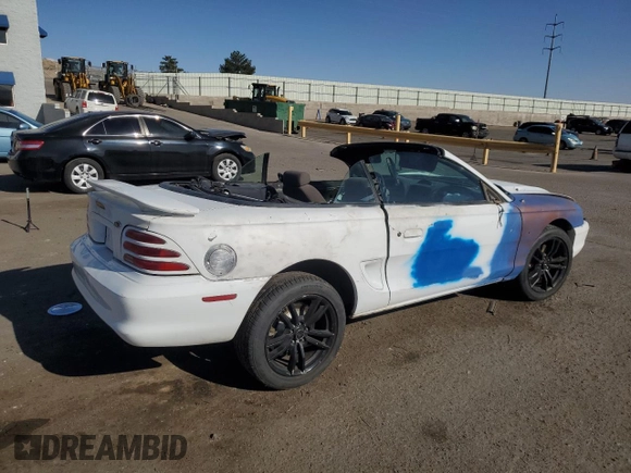1994 Ford Mustang with VIN 1FALP45T8RF205391, listed as a Copart auction lot 54699065 with 167,335 mi miles and Salvage title. Bid and sale history available at DreamBid. Image 3.