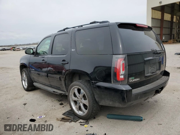 2009 GMC Yukon SLT 4SB with VIN 1GKFK33009R280856, listed as a Copart auction lot 51522635 with 265,941 mi miles and Salvage Title. Bid and sale history available at DreamBid. Image 2.