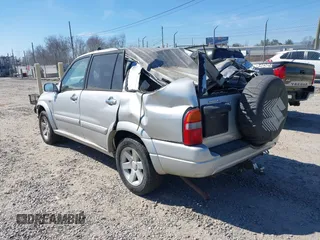 2002 Suzuki XL-7 Standard with VIN JS3TX92V724111616, listed as a IAAI auction lot 41642618 with 197,295 mi miles. Bid and sale history available at carsss.com. Image 3.