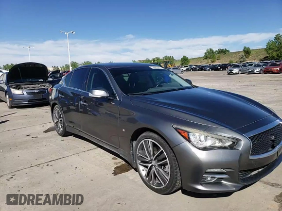 2015 Infiniti Q50 Premium z VIN JN1BV7AR6FM401105, wystawiony jako Copart lot #56982265 z przebiegiem 108 256 mil mil oraz Czysty tytuł • Clean title. Historia ofert i sprzedaży dostępna na DreamBid. Obrazek 13.