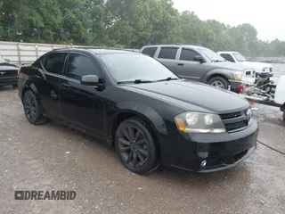 2013 Dodge Avenger SXT with VIN 1C3CDZCB5DN716005, listed as a IAAI auction lot 42644469 with 205,527 mi miles and . Bid and sale history available at DreamBid. Image 1.