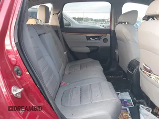 2020 Honda CR-V Touring with VIN 2HKRW2H96LH659793, listed as a IAAI auction lot 41145758 with 113,344 mi miles and . Bid and sale history available at DreamBid. Image 8.