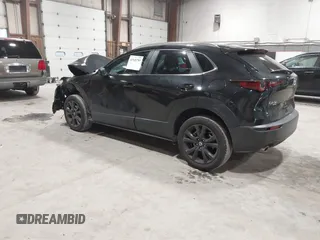 2025 Mazda CX-30 S Select Sport with VIN 3MVDMBBM2SM755621, listed as a IAAI auction lot 41945799 with 2,401 mi miles and . Bid and sale history available at DreamBid. Image 3.
