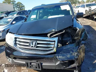 2015 Honda Pilot Touring with VIN 5FNYF3H97FB016390, listed as a IAAI auction lot 41753590 with 217,156 mi miles. Bid and sale history available at carsss.com. Image 12.