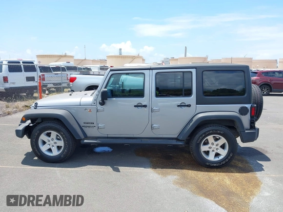 2016 Jeep Wrangler Unlimited Freedom with VIN 1C4BJWDG7GL109953, listed as a IAAI auction lot 42140111 with 24,570 mi miles and . Bid and sale history available at DreamBid. Image 14.