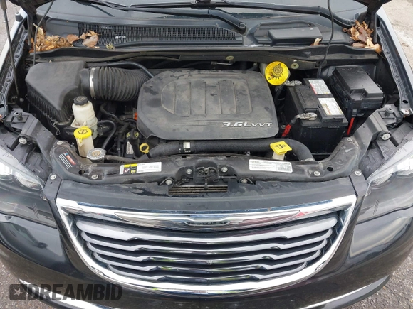 2015 Chrysler Town & Country S with VIN 2C4RC1HG6FR674254, listed as a IAAI auction lot 41199889 with 132,598 mi miles and . Bid and sale history available at DreamBid. Image 10.