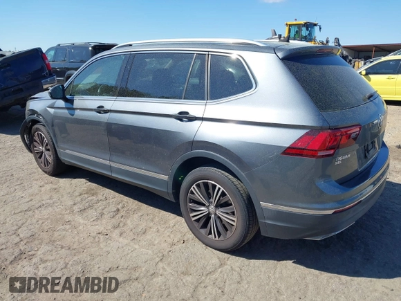 2018 Volkswagen Tiguan SEL with VIN 3VV3B7AX5JM036164, listed as a IAAI auction lot 41876403 with 108,269 mi miles and . Bid and sale history available at DreamBid. Image 3.