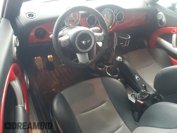 2005 MINI Convertible S с VIN WMWRH334X5TF82551, выставлен на аукционе Copart как лот 57983355 с пробегом 73 885 миль миль и Списание • Salvage title. История ставок и продаж доступна на DreamBid. Изображение 8.