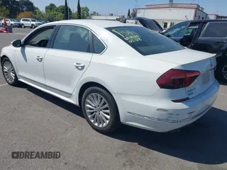 2017 Volkswagen Passat SE with VIN 1VWBT7A30HC037915, listed as a IAAI auction lot 42093170 with 98,968 mi miles and . Bid and sale history available at DreamBid. Image 3.