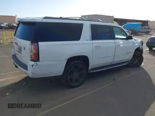 2015 GMC Yukon XL SLT with VIN 1GKS1HKC2FR612690, listed as a IAAI auction lot 41234188 with 113,830 mi miles. Bid and sale history available at carsss.com. Image 4.