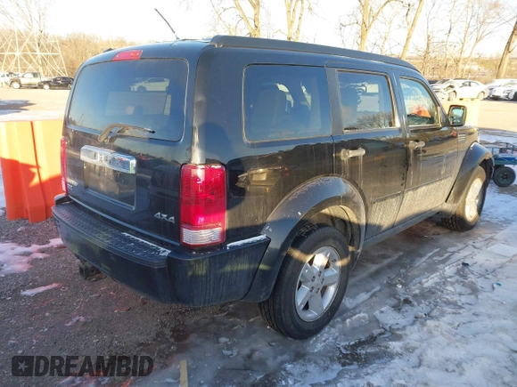2007 Dodge Nitro SLT with VIN 1D8GU58K27W549214, listed as a IAAI auction lot 41358109 with 99,530 mi miles. Bid and sale history available at carsss.com. Image 4.
