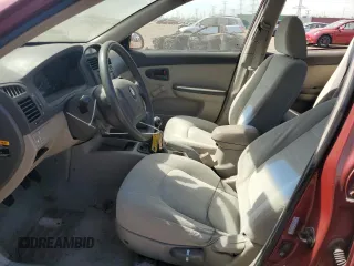 2005 Kia Spectra LX z VIN KNAFE121355162932, wystawiony jako Copart lot #56292625 z przebiegiem 92 828 mil mil oraz Szkoda całkowita • Salvage title. Historia ofert i sprzedaży dostępna na DreamBid. Obrazek 7.