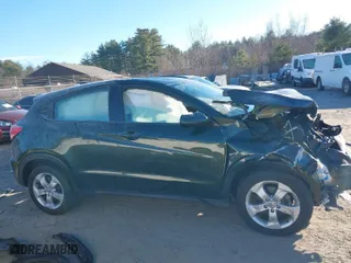 2018 Honda HR-V LX with VIN 3CZRU6H36JG705115, listed as a IAAI auction lot 41008871 with 64,556 mi miles. Bid and sale history available at carsss.com. Image 14.