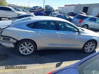 2015 Chevrolet Impala LTZ with VIN 2G1165S34F9101489, listed as a IAAI auction lot 42141525 with 149,037 mi miles and . Bid and sale history available at DreamBid. Image 14.
