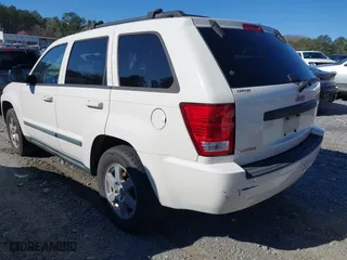 2009 Jeep Grand Cherokee Laredo with VIN 1J8GS48K89C508808, listed as a IAAI auction lot 41821130 with 266,712 mi miles. Bid and sale history available at carsss.com. Image 3.