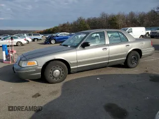 2004 Ford Police Interceptor Base w/3.27 Axle with VIN 2FAFP71W14X175209, listed as a Copart auction lot 80669494 with 216,335 mi miles and Salvage title. Bid and sale history available at DreamBid. Image 1.