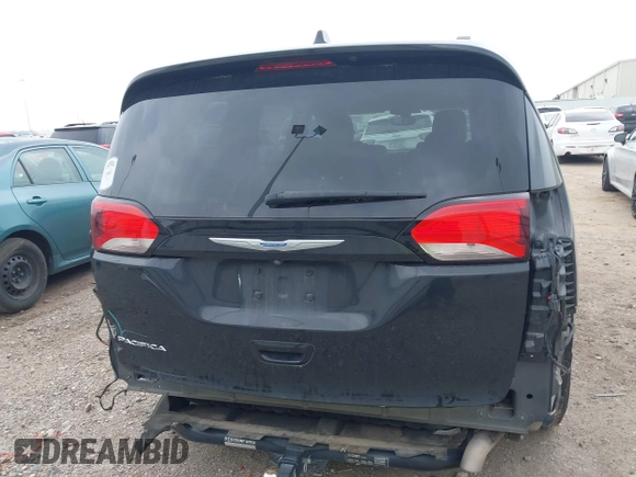 2018 Chrysler Pacifica Touring L Plus z VIN 2C4RC1EG7JR158093, wystawiony jako IAAI lot #41790088 z przebiegiem 116 772 mil mil oraz . Historia ofert i sprzedaży dostępna na DreamBid. Obrazek 17.