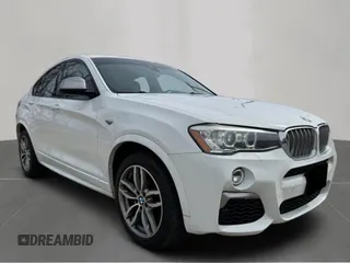2018 BMW X4 M40i with VIN 5UXXW7C52J0W64992, listed as a Copart auction lot 49122325 with 97,967 mi miles and Clean Title. Bid and sale history available at carsss.com. Image 1.