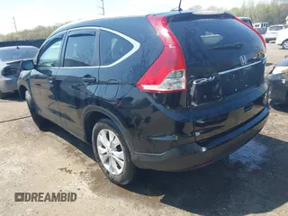 2014 Honda CR-V EX-L with VIN 2HKRM4H76EH673891, listed as a IAAI auction lot 42009693 with 103,798 mi miles. Bid and sale history available at carsss.com. Image 3.