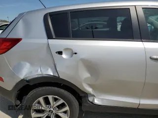2015 Kia Sportage LX z VIN KNDPB3AC9F7676059, wystawiony jako Copart lot #54330655 z przebiegiem 160 346 mil mil oraz Szkoda całkowita • Salvage title. Historia ofert i sprzedaży dostępna na DreamBid. Obrazek 11.