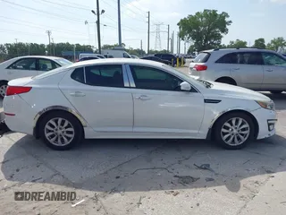 2015 Kia Optima EX with VIN 5XXGN4A72FG414486, listed as a IAAI auction lot 41870529 with 119,029 mi miles. Bid and sale history available at carsss.com. Image 13.