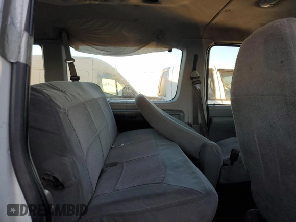 2006 Ford Econoline Passenger XL with VIN 1FBSS31L66DA77295, listed as a Copart auction lot 77022084 with 279,140 mi miles and Salvage Title. Bid and sale history available at carsss.com. Image 11.