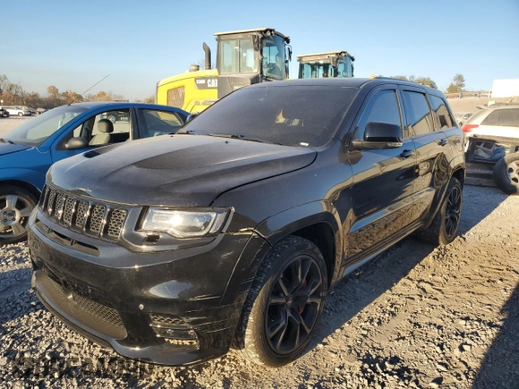 2017 Jeep Grand Cherokee SRT with VIN 1C4RJFDJ6HC828848, listed as a Copart auction lot 75535903 with 106,870 mi miles and Salvage Title. Bid and sale history available at carsss.com. Image 1.