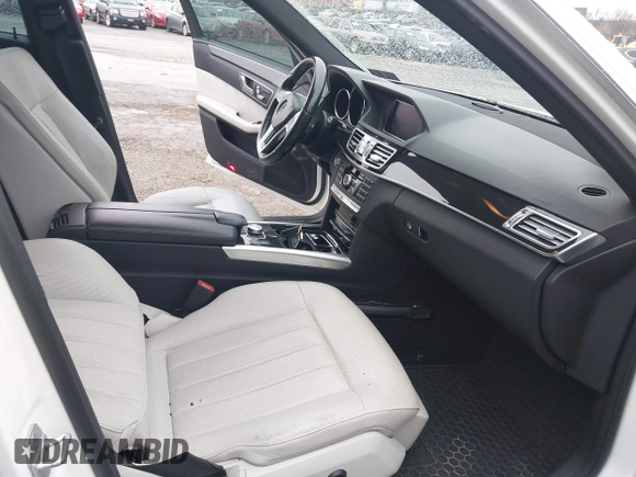 2014 Mercedes-Benz E 550 Sport with VIN WDDHF9BBXEA940995, listed as a IAAI auction lot 41872452 with 50,451 mi miles and . Bid and sale history available at DreamBid. Image 5.
