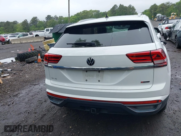 2021 Volkswagen Atlas SE z VIN 1V2KE2CAXMC202664, wystawiony jako IAAI lot #42292276 z przebiegiem 57 760 mil mil oraz . Historia ofert i sprzedaży dostępna na DreamBid. Obrazek 16.