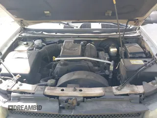 2003 Chevrolet TrailBlazer EXT LT with VIN 1GNES16S236228394, listed as a IAAI auction lot 42043190 with 144,407 mi miles. Bid and sale history available at carsss.com. Image 10.