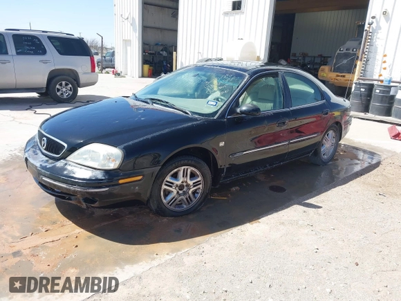 2000 Mercury Sable LS Premium with VIN 1MEFM55SXYA645345, listed as a IAAI auction lot 41778827 with 196,746 mi miles. Bid and sale history available at carsss.com. Image 2.