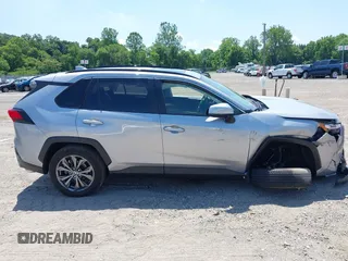 2022 Toyota RAV4 Hybrid XLE Premium with VIN JTMB6RFV1ND063963, listed as a IAAI auction lot 42550907 with 35,012 mi miles and . Bid and sale history available at DreamBid. Image 13.