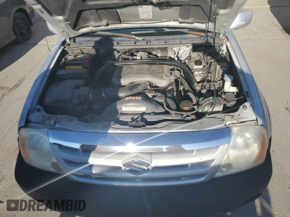 2005 Suzuki XL7 LX with VIN JS3TX92V054101305, listed as a Copart auction lot 79204124 with 149,589 mi miles and Salvage title. Bid and sale history available at DreamBid. Image 12.